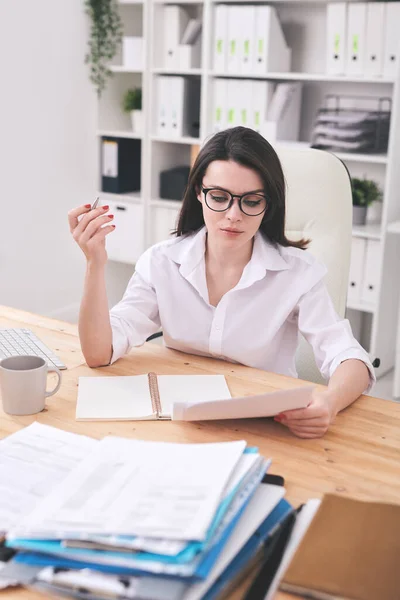 Serious Office Manager Analyst Formalwear Looking Financial Papers While Sitting — Stock Photo, Image