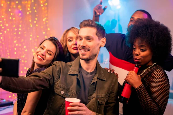 Smiling Young Man Holding Smartphone Face Himself While Making Selfie — Foto de Stock