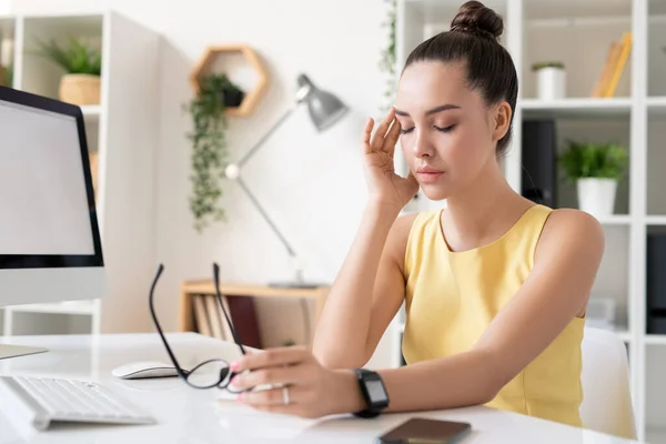 Puzzled Young Brunette Businesswoman Touching Temple While Suffering Migraine Modern — Stock Photo, Image