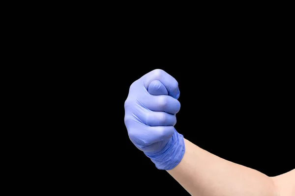 Fig as a hand gesture, denoting humiliation or denial. Male hand in purple latex glove. — Stock Photo, Image