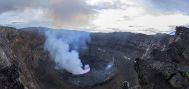 Crater of nyiragongo volcano in eruption clipart