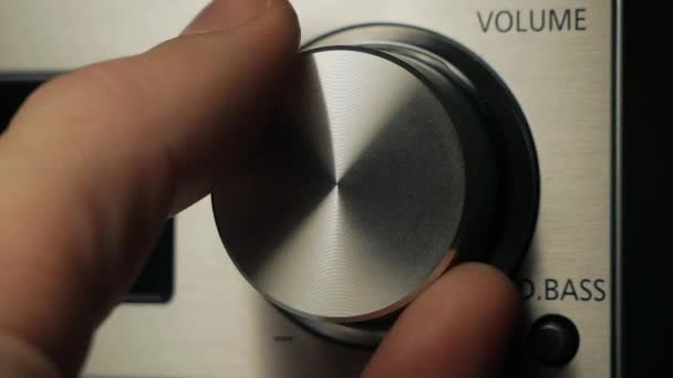 Man Adjusts Volume — Stock Video