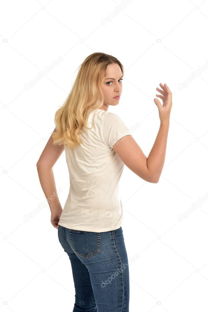 3/4 portrait of blonde girl wearing white shirt,  isolated on white background.