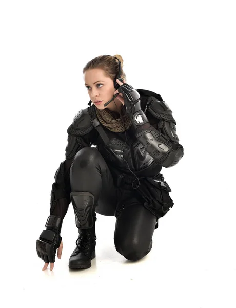 Full Length Portrait Female Soldier Wearing Black Tactical Armour Seated — Stock Photo, Image