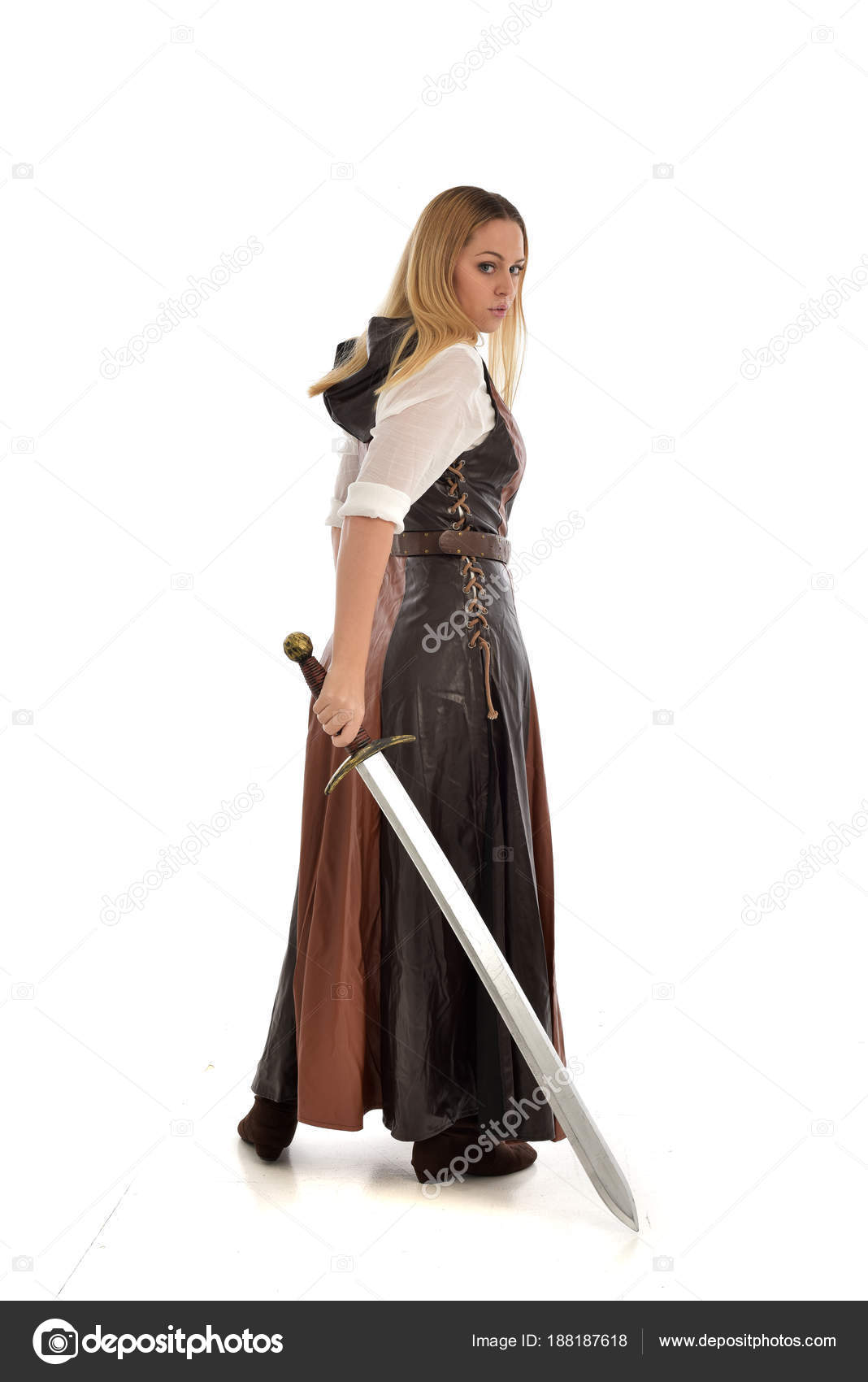 young asian woman fighting with katana sword isolated on grey Stock Photo -  Alamy