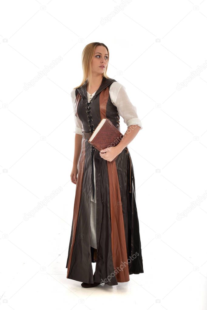 full length portrait of girl wearng brown fantasy outfit, standing pose on white background.