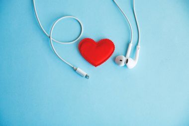 Music is the universal language of mankind, red heart and headphones clipart