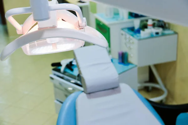 Dentist\'s office. Chair in the dental doctor office top view. Chair for a dentist patient. Equipment for the dental doctor office.