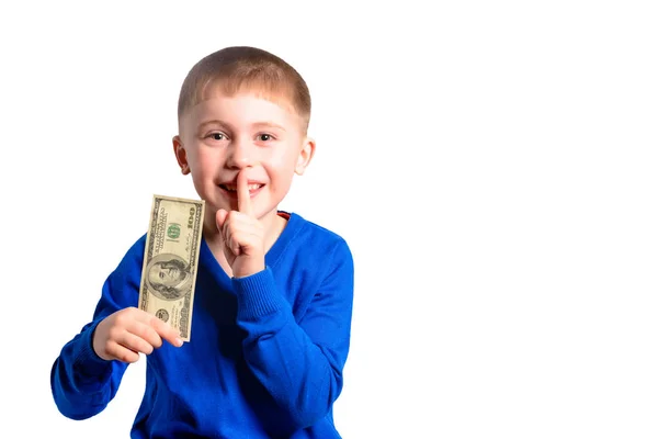 A boy with a 100 dollar note in his hands shows a sign of silence — Stock Photo, Image