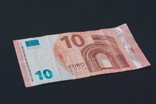 European denomination of ten euros on black background. — ストック写真