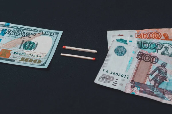 Dollars and Russian rubles on black background — Stok fotoğraf