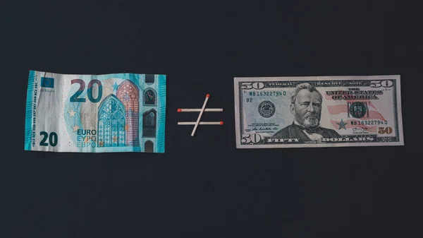 American and European banknotes. Euros and dollars on a black background. — Stok fotoğraf