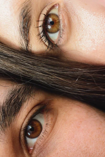 Close up portrait of half faces man and woman looking at camera. — Stock Photo, Image