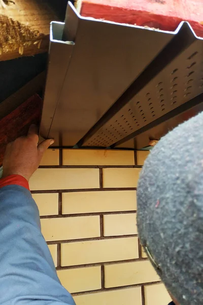 Closeup of eaves hanging in newly built houses. — Stok fotoğraf