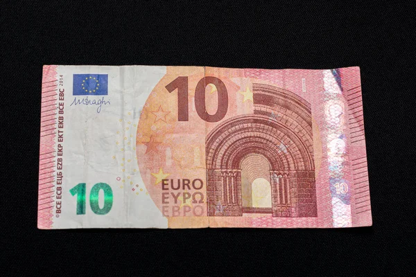European denomination of ten euros on black background. — ストック写真