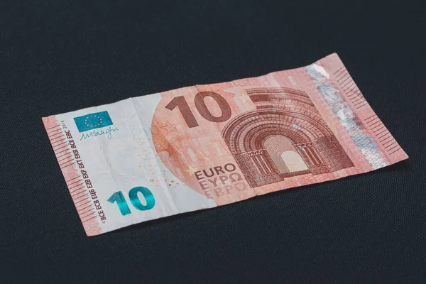 European denomination of ten euros on black background. — Stock Photo, Image