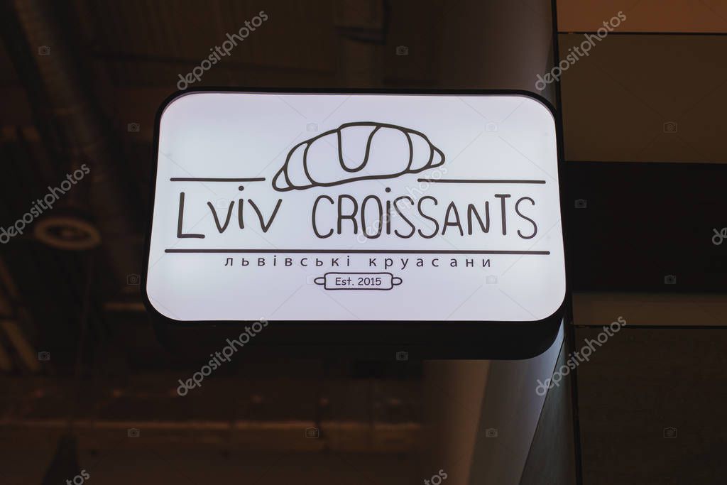 Mainz, Germany January 28, 2020 signage shops at the local train station in the evening.2020