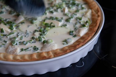 Cooking dough in a vegetable pie bowl: hand-kneading process - cooking photo