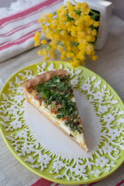 Ready meal: vegetarian shortcrust pastry pie stuffed with vegetables: corn, zucchini, cheese, green onions - food photography