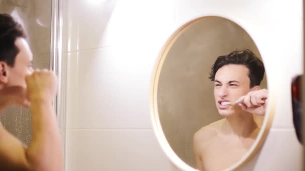 Young Man Brushing His Teeth Bathroom Health Care Dental Hygiene — Stock Video