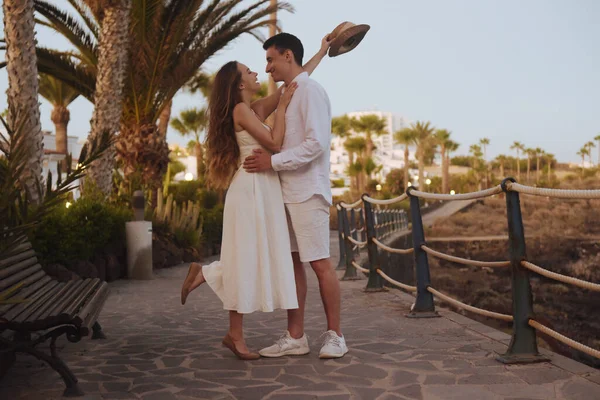 Couple Strolling Coast Ocean Background Palm Trees Girl Long White — 스톡 사진