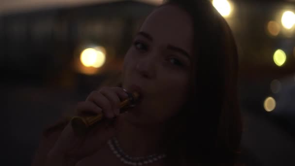 Girl Smokes Vape Background Moon City Ocean Night Model Hat — Stock Video