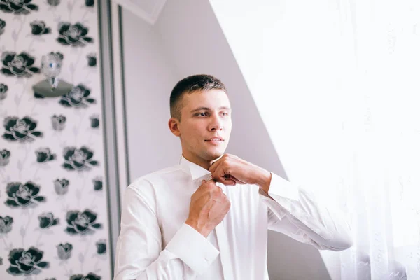 Young Handsome Man Getting Dressed Indoors — Stock Photo, Image