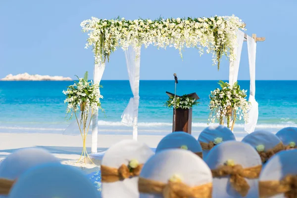 Floral, flowers wedding arches decoration with the wedding altar, beach wedding venue at Samet island, Thailand
