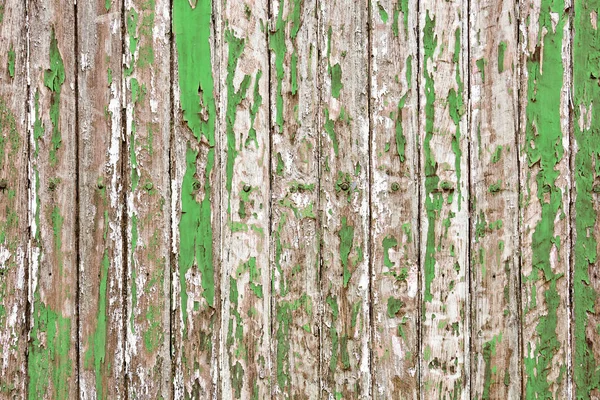 Alte hölzerne Wand mit blassgrünem Farbpeeling bemalt offenbarte rustikale Textur — Stockfoto