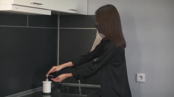 Woman Medical Mask Black Washes Her Hands Thoroughly Uses Liquid — Stock Video