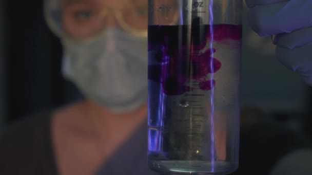 Portrait Young Doctor Girl Holding Measuring Glass Water Purple Potassium — Stock Video