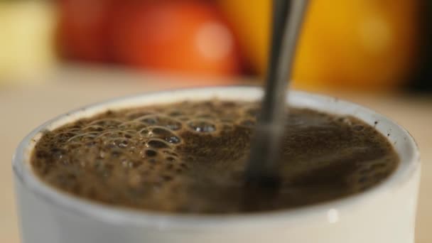 Man mixing sugar in the coffee espresso close up — Stock Video