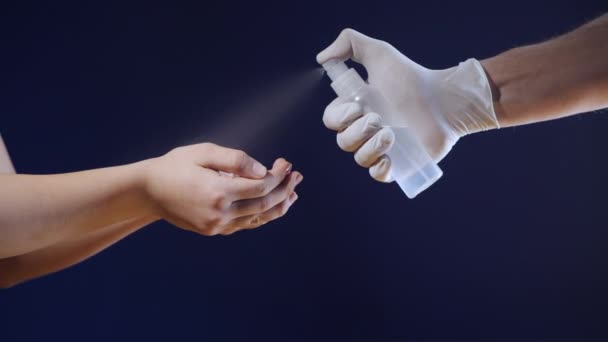 Close Hands Man White Medical Gloves Sprays Disinfectant Girl Hands — Stock Video