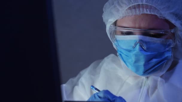 Medical worker in protective clothing at work, close-up — Stock Video