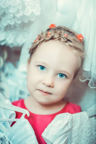 Little girl and new clothes — Stock Photo, Image