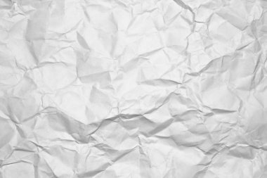 Arka plan beyaz bir buruşuk kağıt.