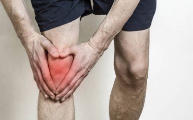 Pain in the knee of a man. Injury of the knee in the athlete. Meniscus. clipart