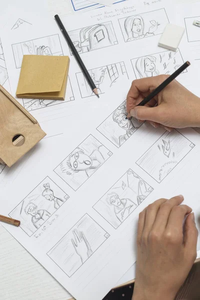 The Artist Draws Anime Comics On Paper Storyboard For The Cartoon The  Illustrator Creates Sketches For The Book Stock Photo - Download Image Now  - iStock