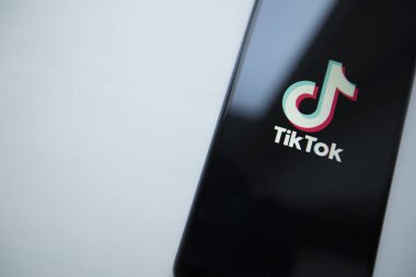 Ukraine, Kyiv - Dec. 22th, 2019 : Tik Tok logo on the phone screen. Application for creating short videos.