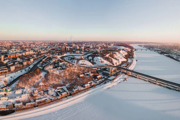 panorama of the city in winter at sunset.