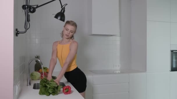 Young Woman Washes Fresh Vegetables Vegetables Tomatoes Red Peppers Lettuce — Stock Video