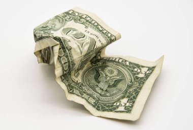 Hafif bir arka planda buruşmuş bir dolar..