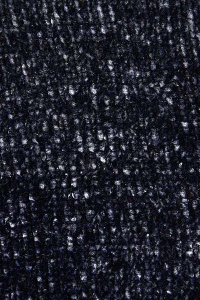 Full frame of knitted dark blue with white splashes sweater as a backdrop. Horizontal dark blue background pattern. — Stok fotoğraf