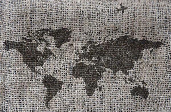 Map World Drawn Rough Gray Cloth Plane Flies Continents Illustration — Stock Photo, Image