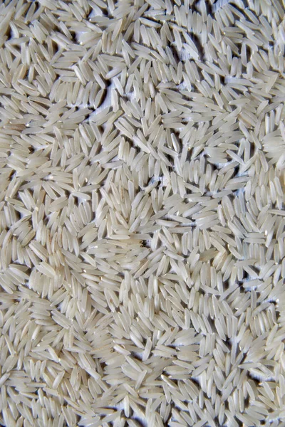 白米种子纹理背景的顶视图 有机的 天然的长米粒 健康的食物 — 图库照片