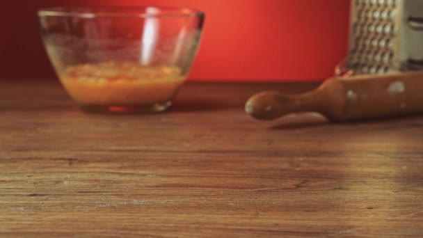 Baker hand preparing flour on the table to make dough slow motion — Stock Video