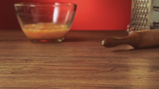 Baker hand preparing flour on the table to make dough slow motion — Stock Video