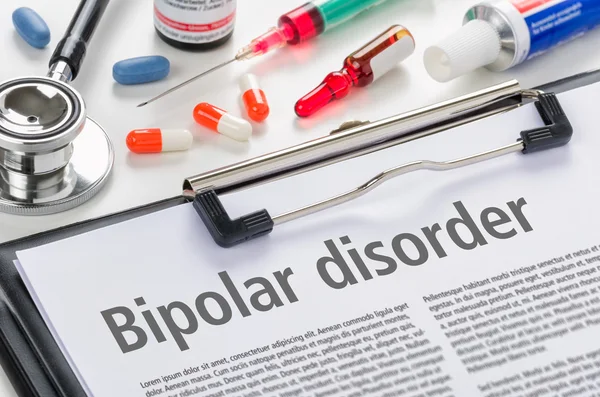 The diagnosis Bipolar disorder written on a clipboard — Stock Photo, Image