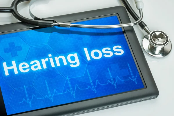 Tablet mit der Diagnose Hörverlust auf dem Display — Stockfoto