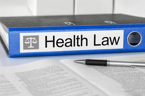 Blå mapp med etiketten Health Law — Stockfoto